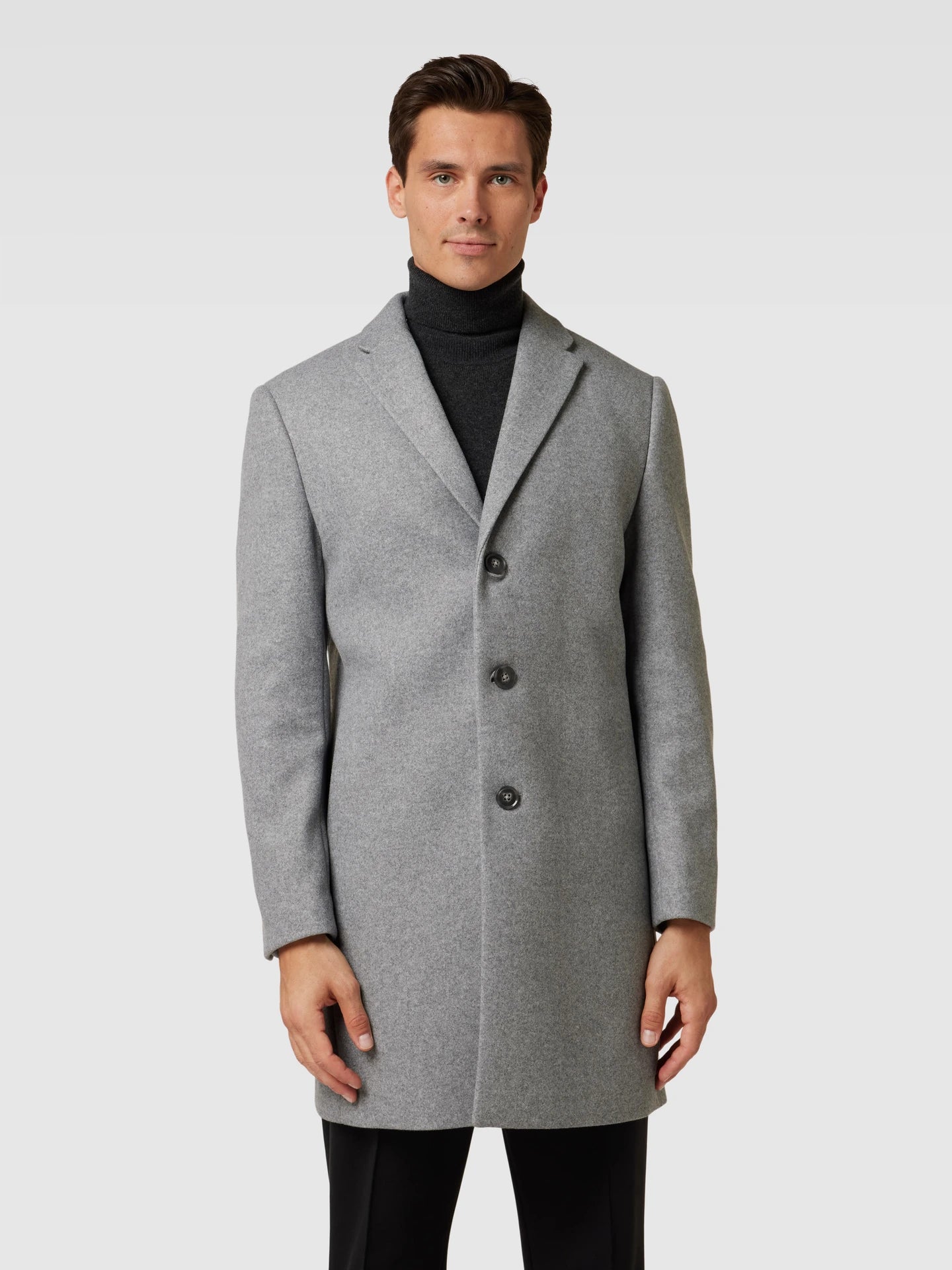 Coat with lapel collar